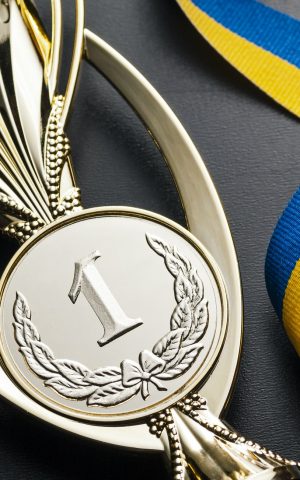 Gold winners medal for a competition or race